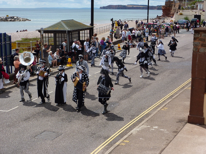<p>Daytime procession at Sidmouth 2010. Photo by Mike Tabecki.</p>