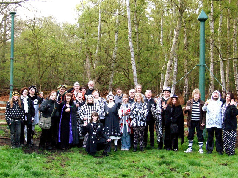 <p>Pig Dyke, without their clothes on at sunrise on Holme Fen, Mayday 2008. The post marks the lowest point in England, where the plughole used to be</p>
